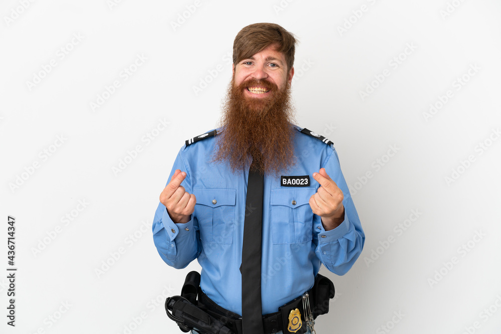 Redhead police man isolated on white background making money gesture Redhead police man isolated on white background making money gesture