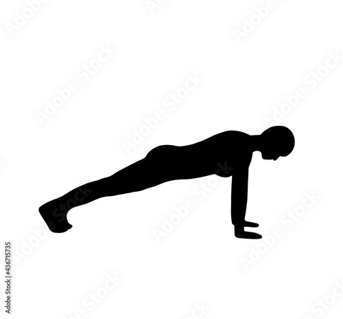 silhouette of a person exercising yoga push up 