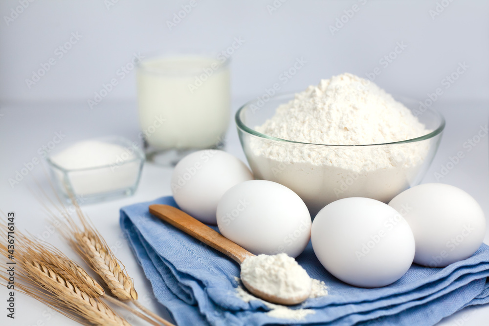 Cupcake baking process. Eggs and flour on the table. Cooking process. Close-up. Cupcake baking process. Eggs and flour on the table. Cooking process. Close-up.