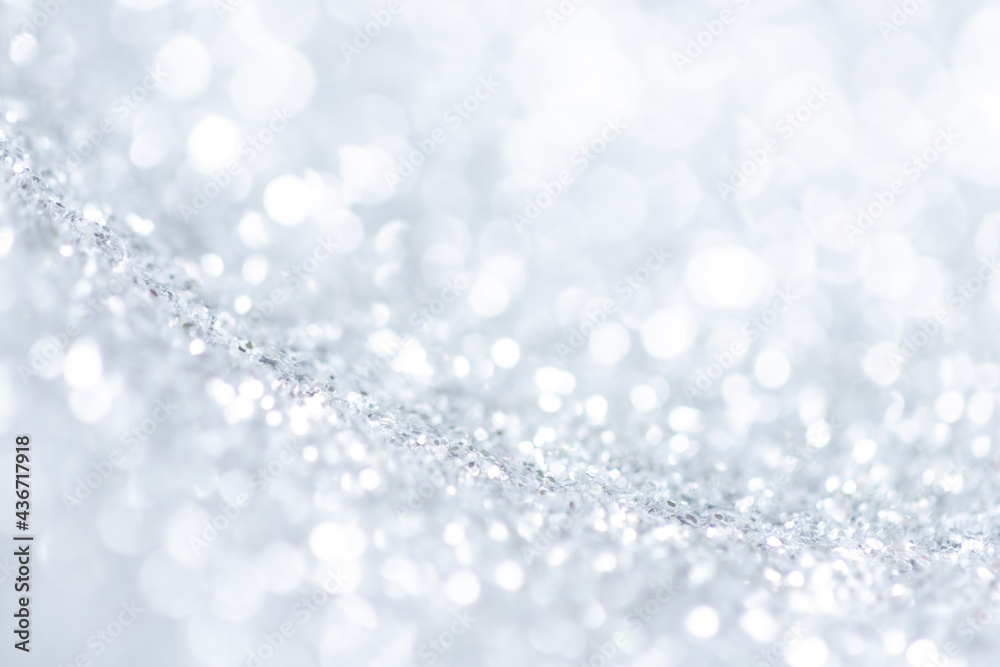 white, grey and silver blur bokeh abstract background. christmas blurred beautiful shiny Christmas lights. white, grey and silver blur bokeh abstract background. christmas blurred beautiful shiny Christmas lights.
