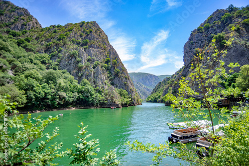 Canyon Matka in North Macedonia beautiful view with rocks, lake, trees and colorful background