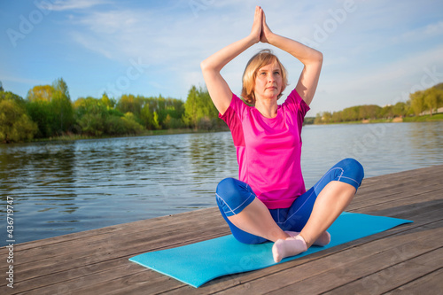 A woman is engaged in yoga
