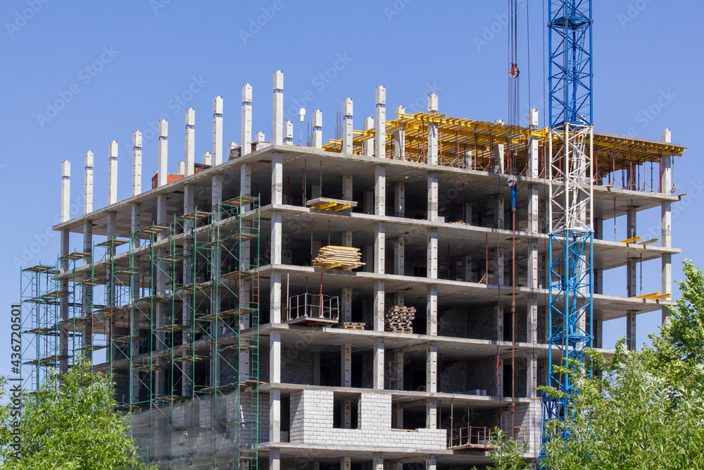 Construction of a residential skyscraper building. View of the construction platform of the new residential area.