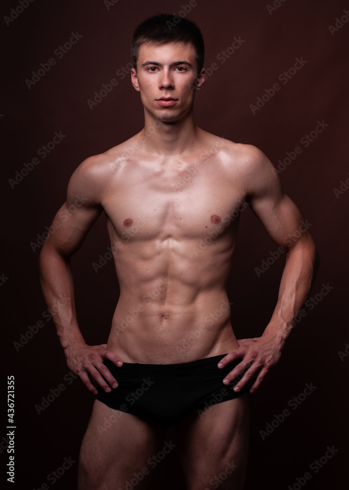 Fitness male model in studio