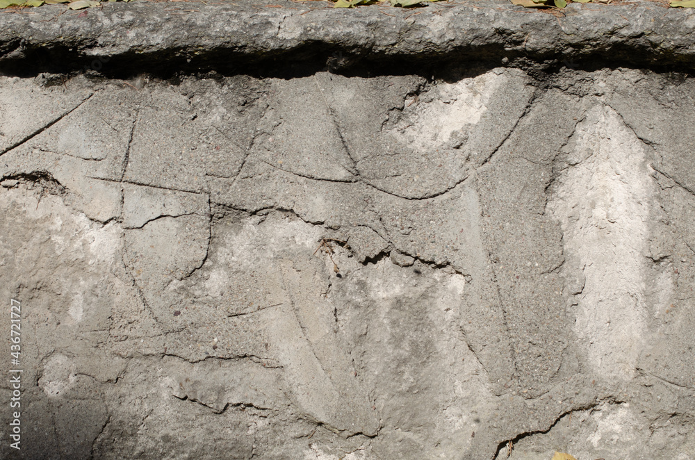 Fototapeta premium old cracked concrete and stone wall