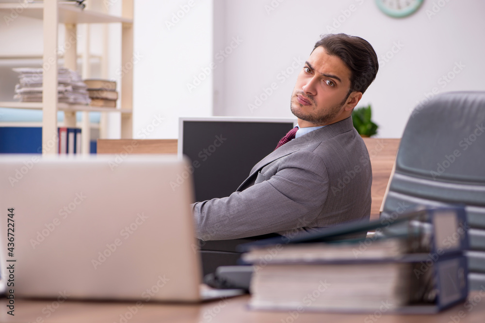 Young businessman employee working in the office
