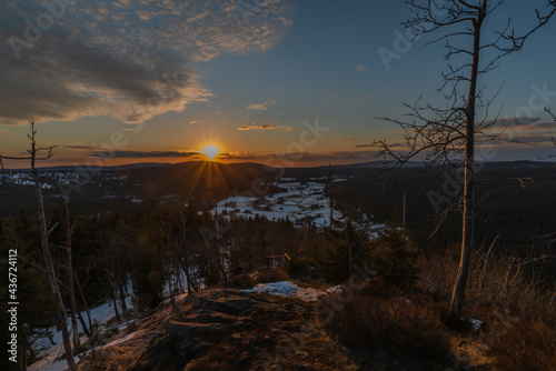 Sunset view from Bukovec hill with blue sky and orange sun