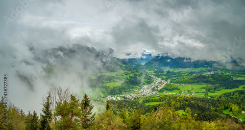 Top mountain view from Kneifelspitze to the City of Berchtesgaden with huge rain clouds at the background © Wolfgang Hauke