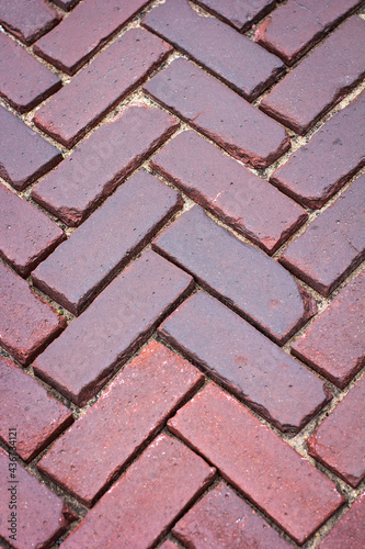 The road paved with old stone blocks close up