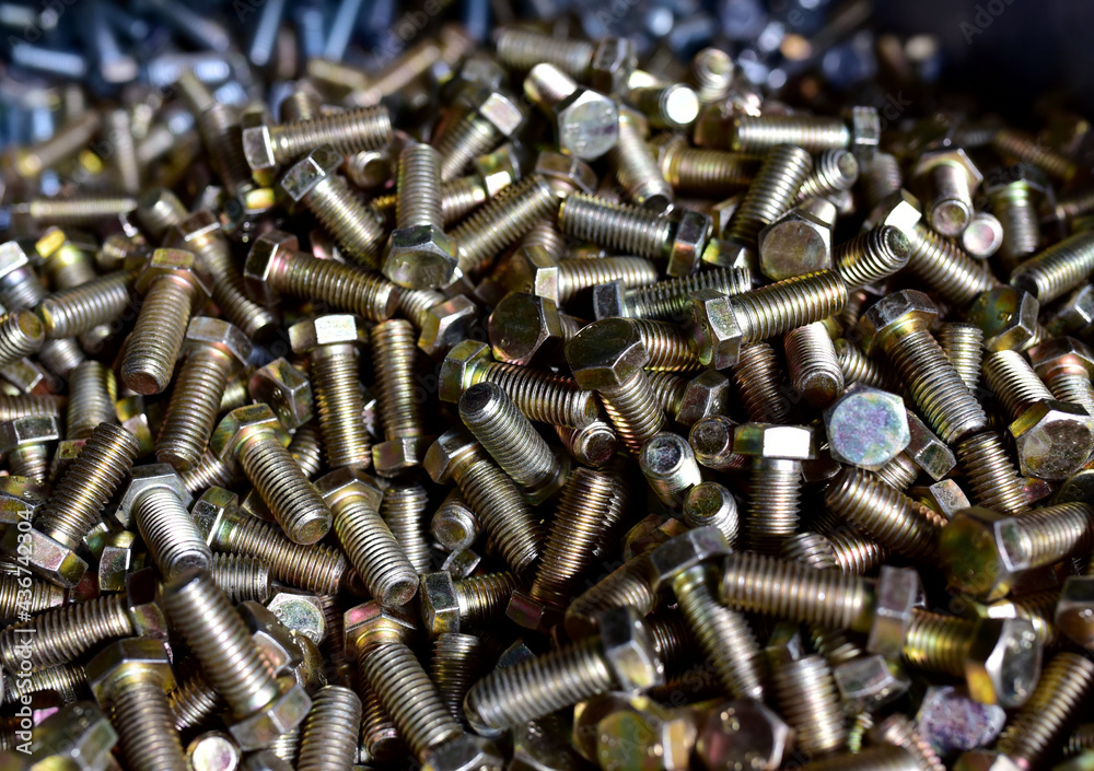 Background of screw bolts, Internal screw, bolts closeup, many screws. Factory equipment and Industrial concept Background of screw bolts, Internal screw, bolts closeup, many screws. Factory equipment and Industrial concept