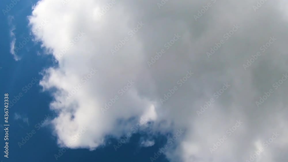 Fast flight of clouds in the blue sky Fast flight of clouds in the blue sky