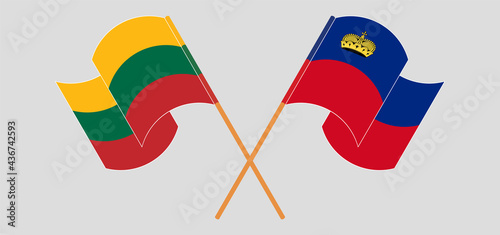 Crossed and waving flags of Lithuania and Liechtenstein
