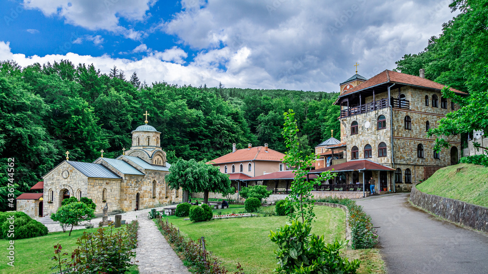 Serbian Orthodox Monastery with cloudy sky. Big Orthodox Monastery in Serbia.