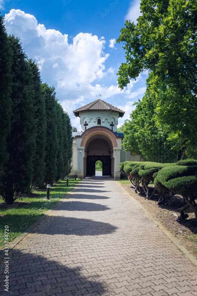 Serbian Orthodox Monastery with cloudy sky. Big Orthodox Monastery in Serbia. Serbian Orthodox Monastery with cloudy sky. Big Orthodox Monastery in Serbia.