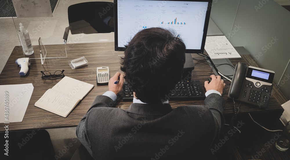 Businessman working in his office