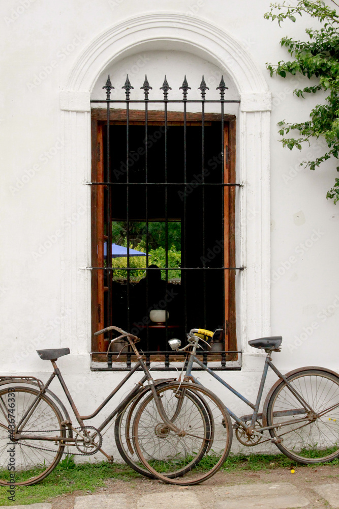 bicycles in front of a house