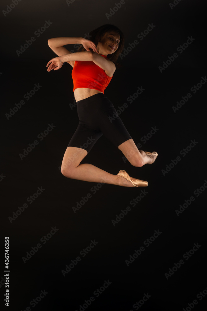 Ballerin a is jumping