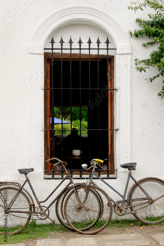 bicycles in front of a house