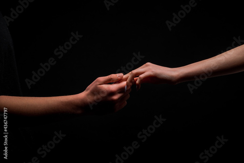Hands of a man and a woman
