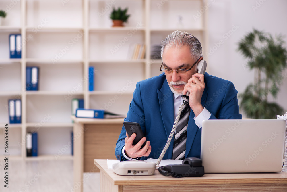 Old male employee and too much work in the office