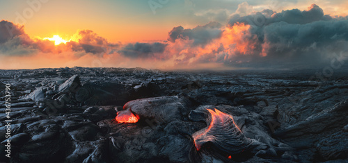 Lava Field under sunset clouds on background photo