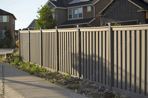 Photo Shot of the fence around the house in the neighborhood during the sunset