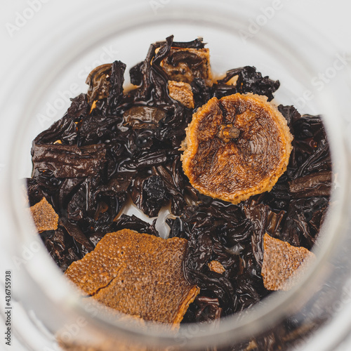 brewed pu-erh leaves in mandarin top view