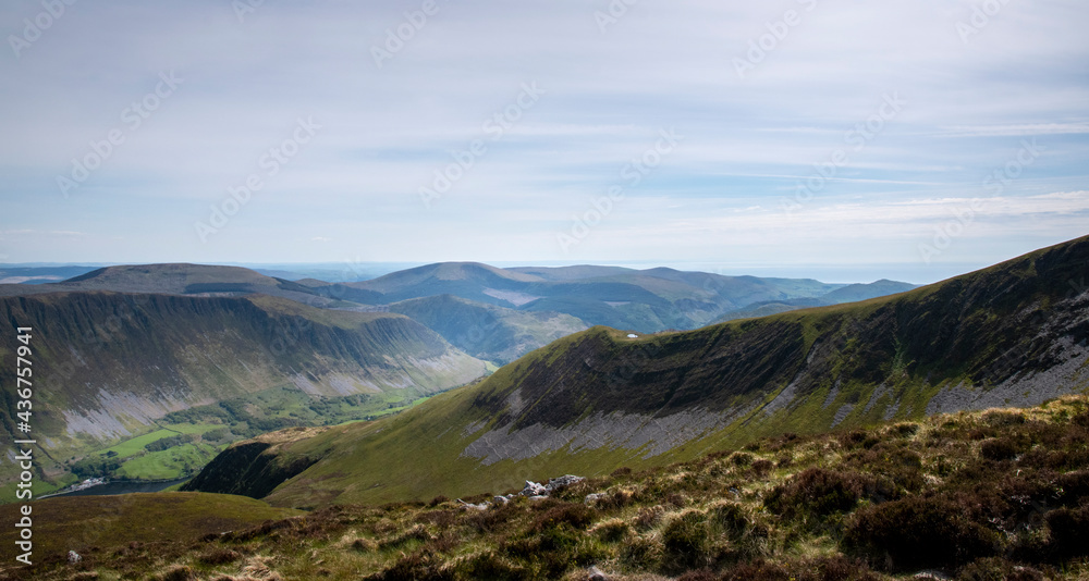 the lines of the mountain tops at Cadair Idris with tal-y-llyn in the valley