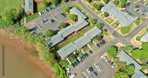 Aerial panorama view of the residential Sayreville town area of beautiful suburb of dwelling apartment complex near river from a height in New Jersey USA photo