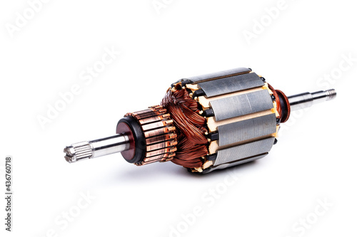 Copper coils inside electric motor isolated on white background.
