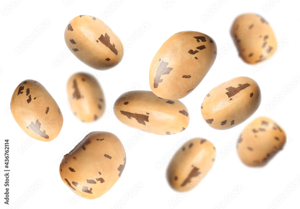 Many beans falling on white background. Vegan diet Many beans falling on white background. Vegan diet