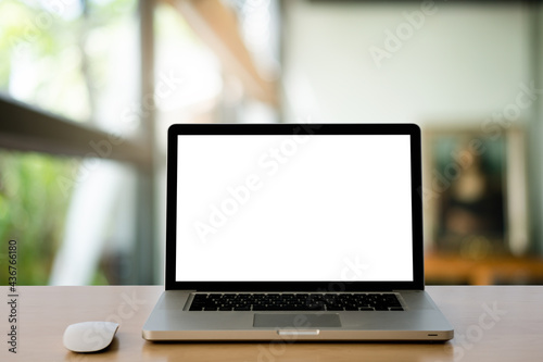 laptop on the wood table