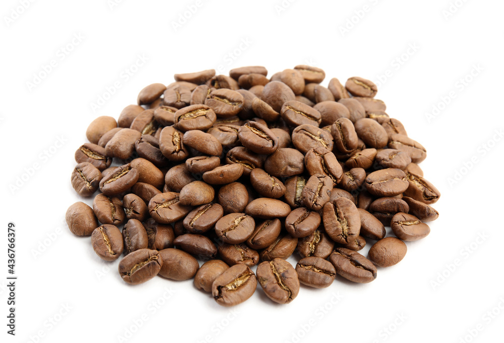Heap of roasted coffee beans isolated on white Heap of roasted coffee beans isolated on white