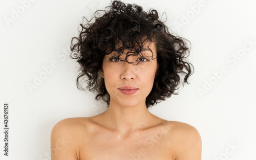 Woman with bared chest isolated on white