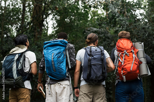 Trekking together in a forest