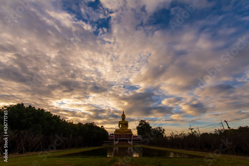 Sky atmosphere with sunset over Big Buddha  Ubon Ratchathani Province  Thailand.