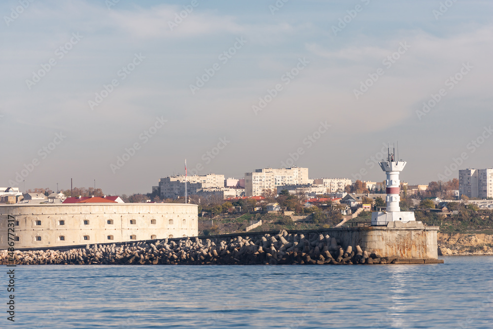Fort at the entrance to Sevastopol Bay. Lighthouse at the entrance to the bay in Sevastopol.