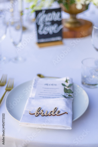 Bride Place Card Romantic Wedding Table Top Layout Table Spread no people no human tropical location with cutlery