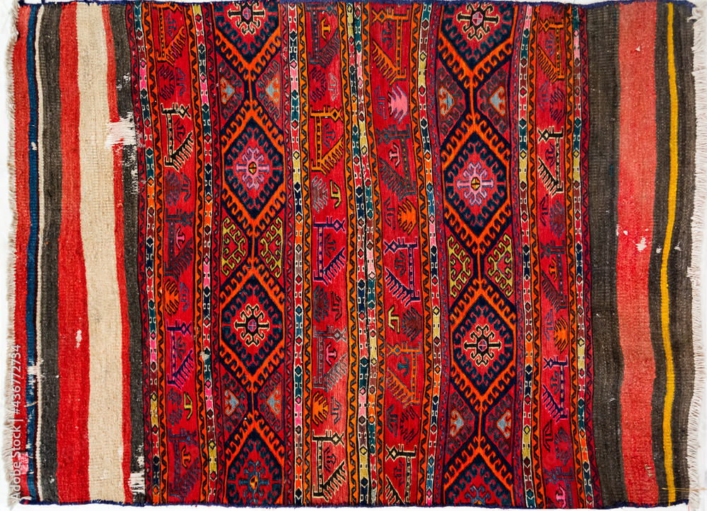 An example of an old Persian carpet at museum of Yazd in Iran. An example of an old Persian carpet at museum of Yazd in Iran.