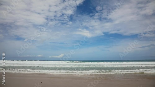 Summer beach with the sunny sky at Phuket island, Thailand. Beautiful scene of blue sky and clouds on a sunny day. Empty holiday sea where the horizon can see clearly