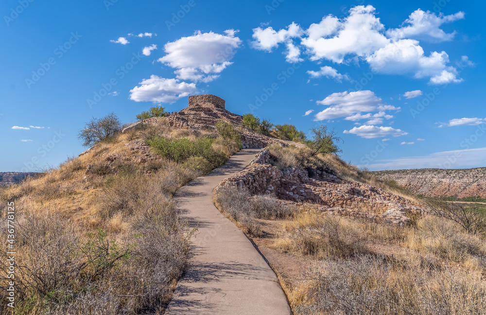 Summer view of Tuzigoot hilltop pueblo National Monument in Arizona in the Verde valley ancient home of the Sinagua people, multi story ruins make of limestone near Clarksdale Summer view of Tuzigoot hilltop pueblo National Monument in Arizona in the Verde valley ancient home of the Sinagua people, multi story ruins make of limestone near Clarksdale