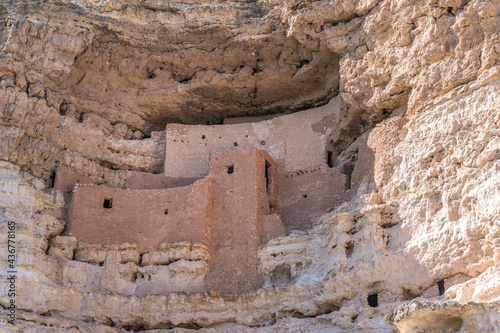 Closeup view of Montezuma castle National Monument ancient cliff dwelling in Camp Verde Arizona built by the indigenous Sinagua people, early stone-and-mortar masonry, constructed from limestone