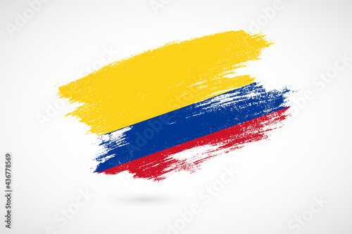 Happy independence day of Colombia with vintage style brush flag background