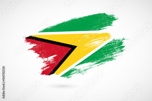 Happy independence day of Guyana with vintage style brush flag background