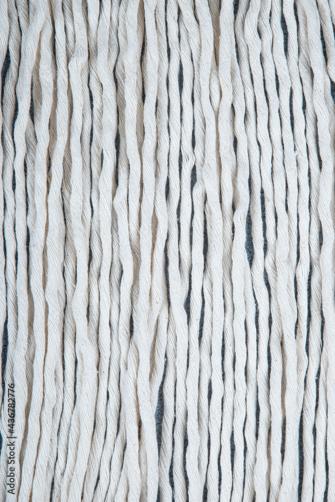 Close-up of white cotton threads textured pattern background. White lines backdrop for design. Close-up of white cotton threads textured pattern background. White lines backdrop for design.