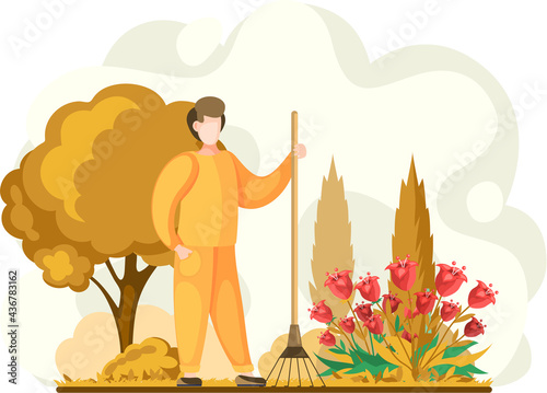 Man gathering seasonal harvest, remove leaves with rake, works on yard with flower bed. Agricultural worker in autumn tidies up garden, removes fallen yellow leaves stands near trees and bushes