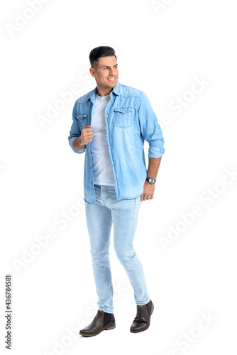 Fashionable young man on white background