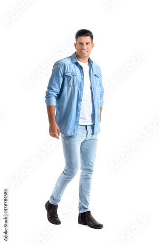 Fashionable young man on white background