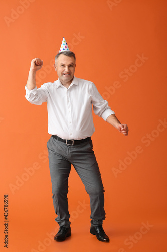 Dancing mature man in party...