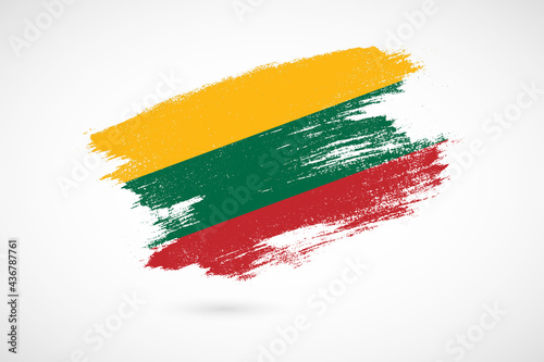 Happy independence day of Lithuania with vintage style brush flag background